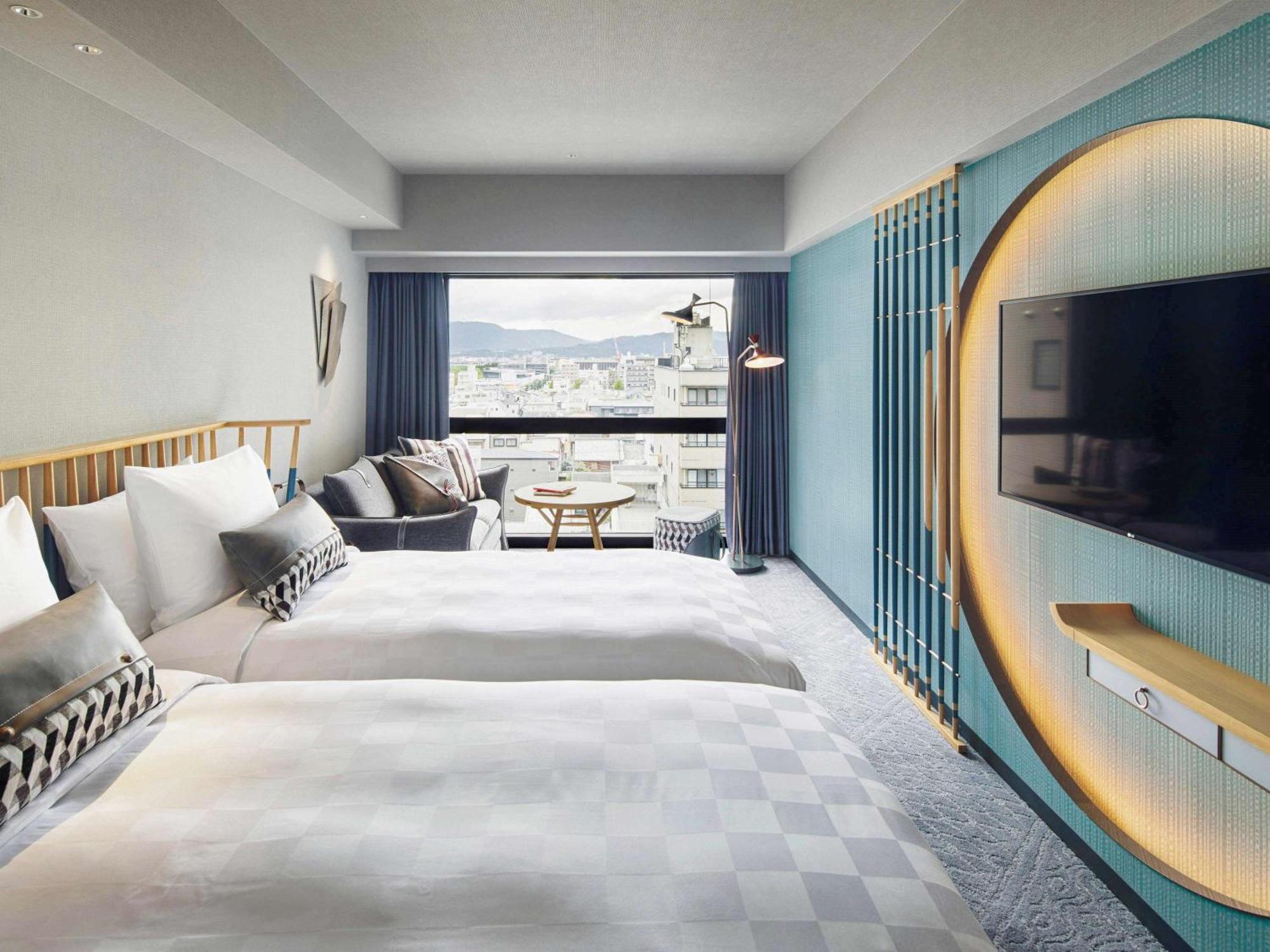 Superior Twin Room with One Sofa Bed and Bath Tub