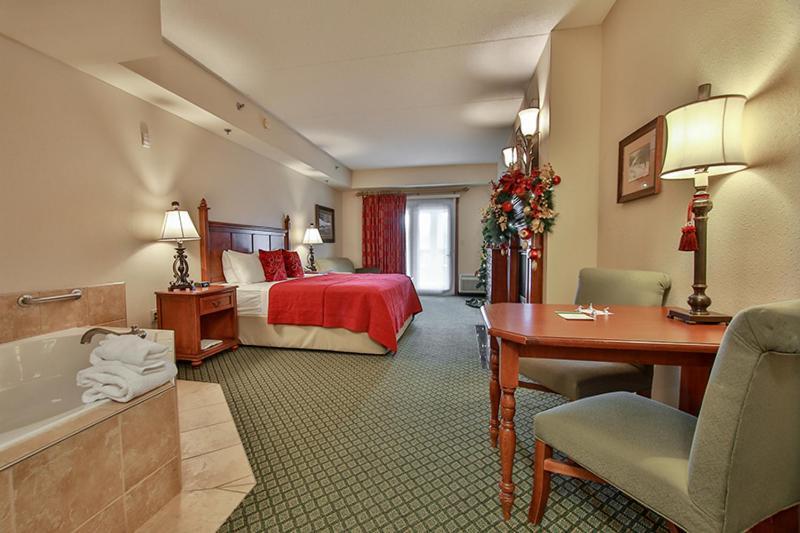 King Bed Mini-suite with Jaccuzzi, Fireplace, and Sleeper Sofa