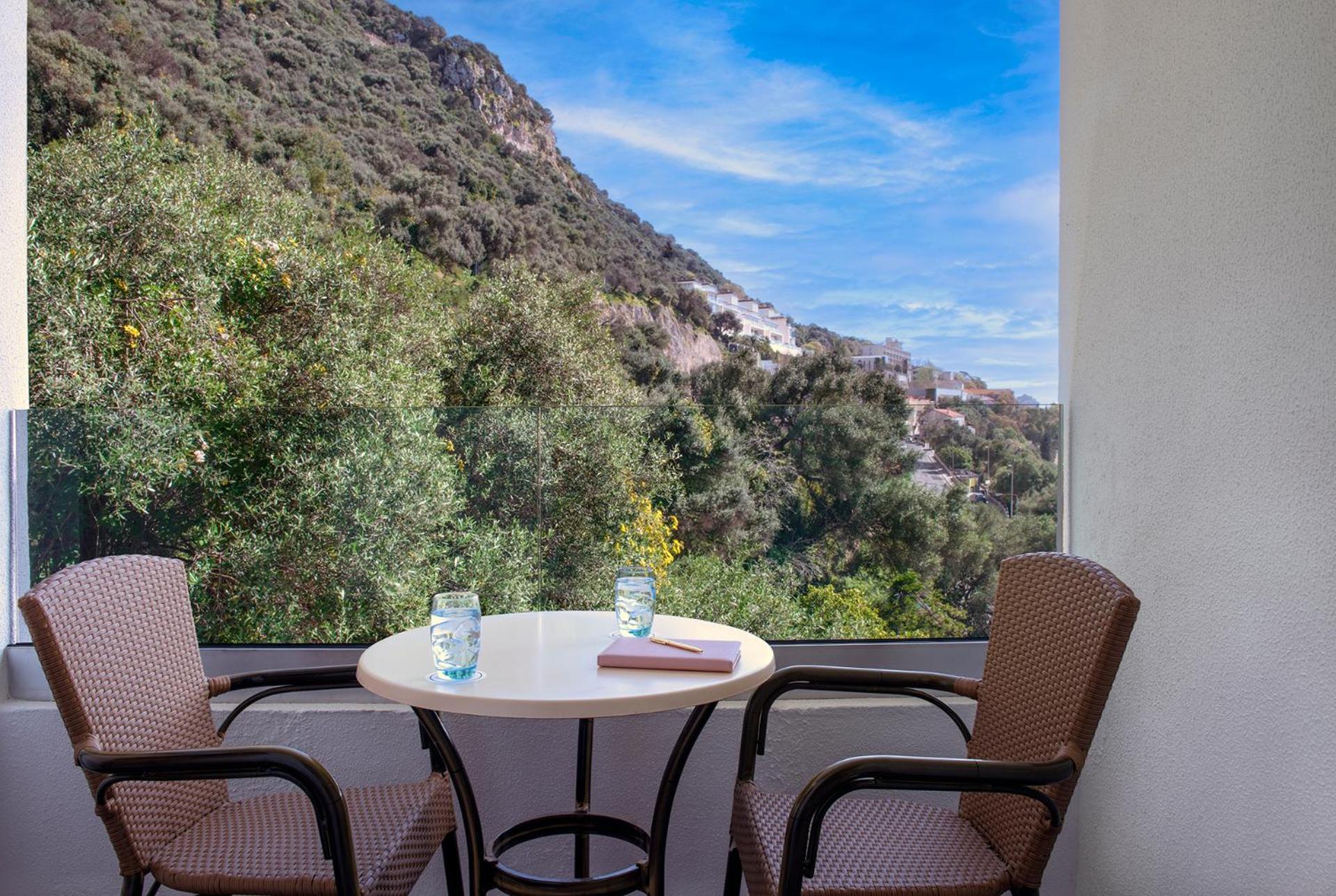 Double Room with Balcony and Rock View