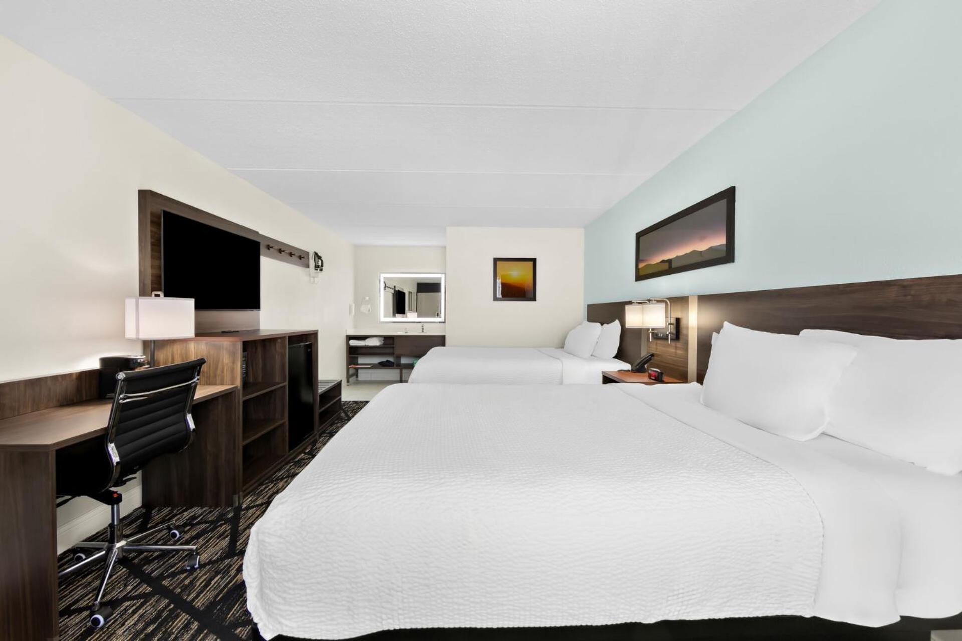 Quadruple Room Two Queen Beds Non Smoking or Exterior Corridor
