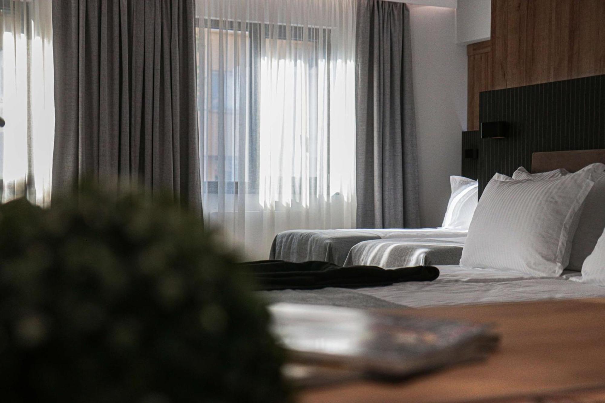 Junior Suite with One Double and Two Single Beds - Non-Smoking,1624313790:JPEG