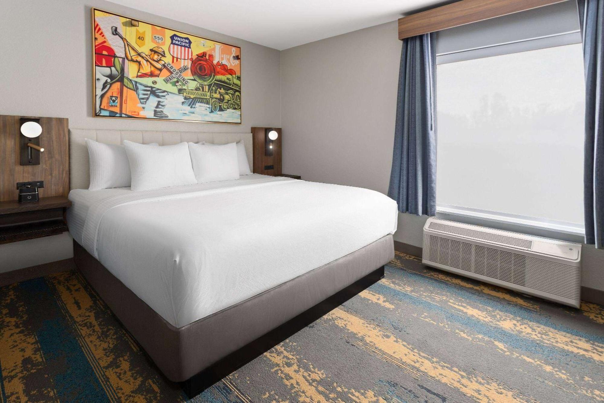 Deluxe King Room with One King Bed and Sofa Bed - Large Living Room and Kitchen - Non-Smoking