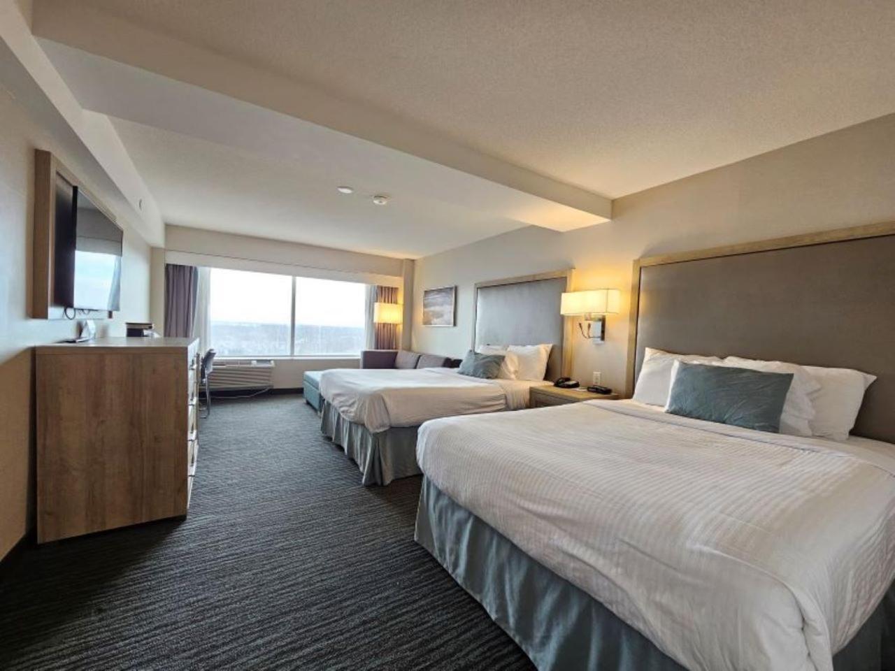 Riverview Deluxe Guest room, 2 Queen Beds & Sofa Bed,1656176717:JPEG