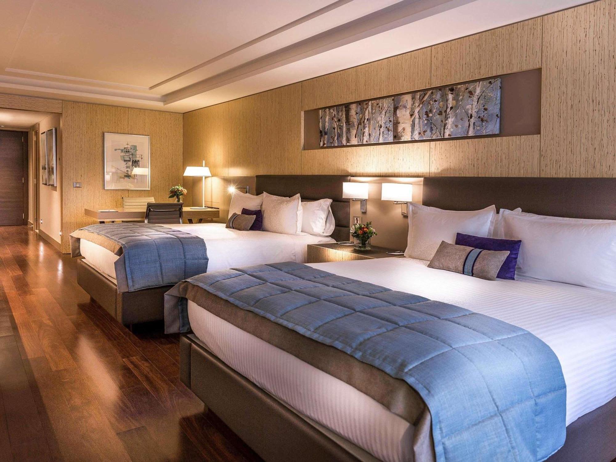 Deluxe Suite with Two Double Beds, Balcony and Park View,1714100467:JPEG